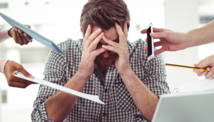 Business Owner Multi tasking stressed